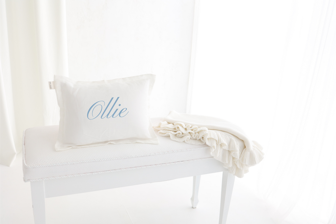 White baby pillow and blanket set